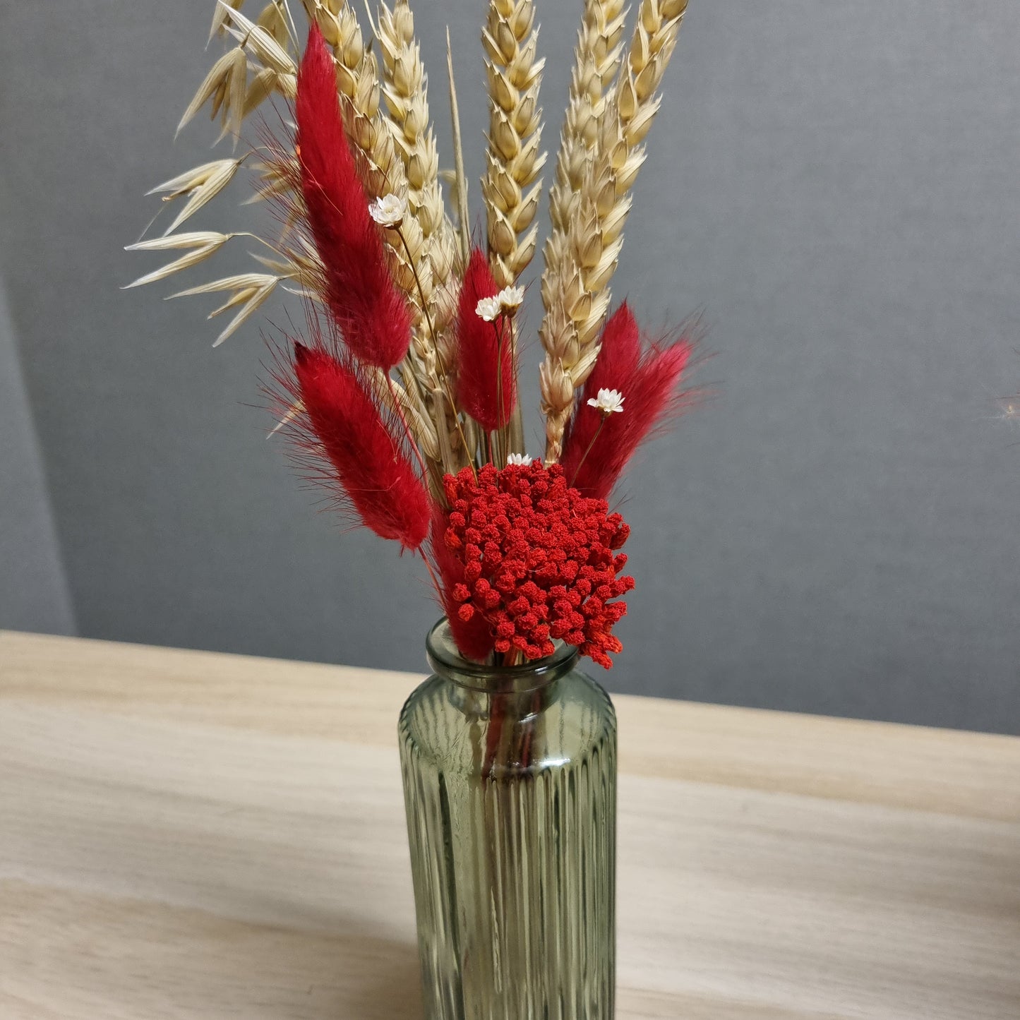 Green Vase Red Arrangement