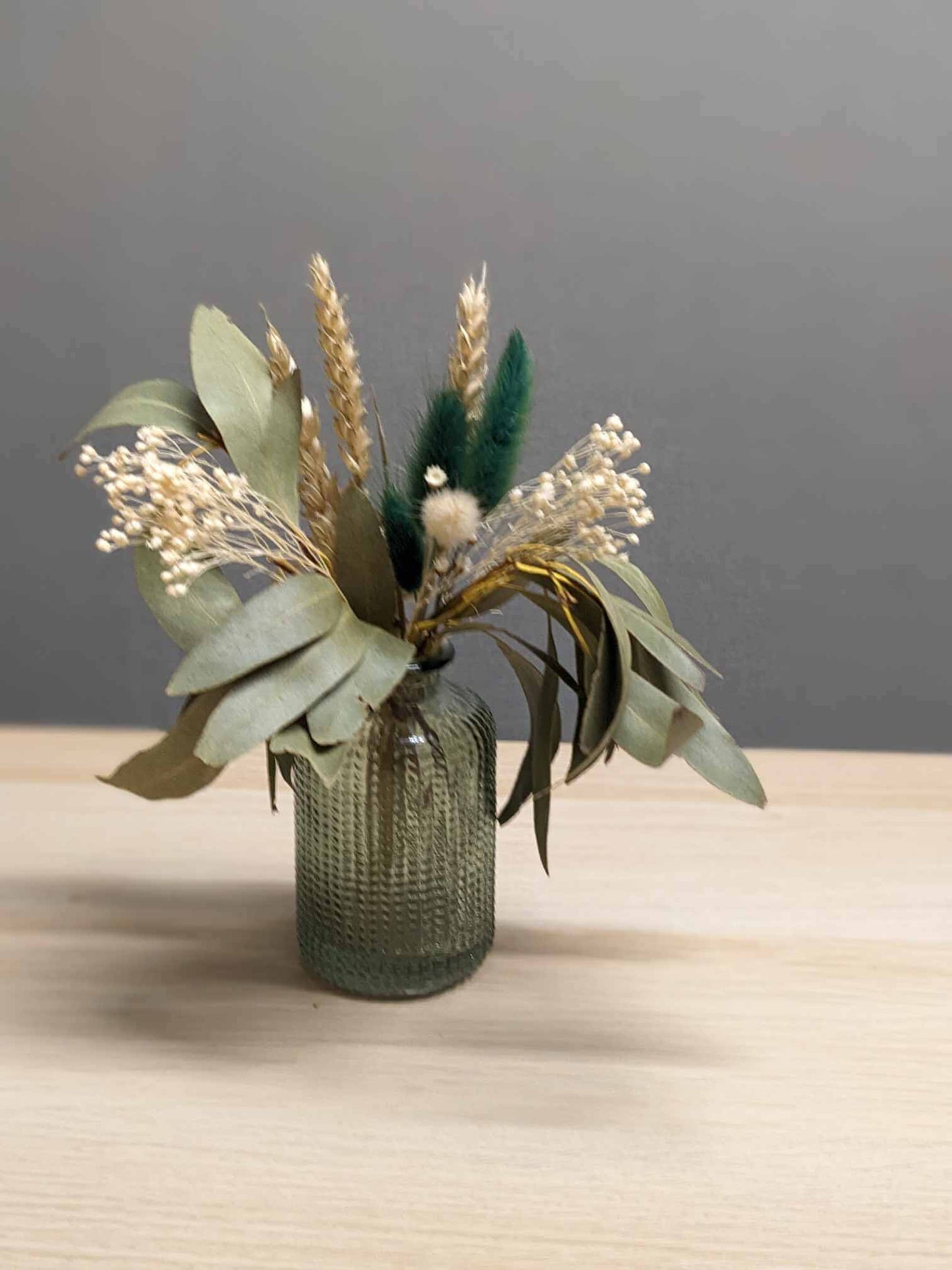 Nature-inspired Bottle Green Vase with Dried Wheat, Bunny Tails and Eucalyptus