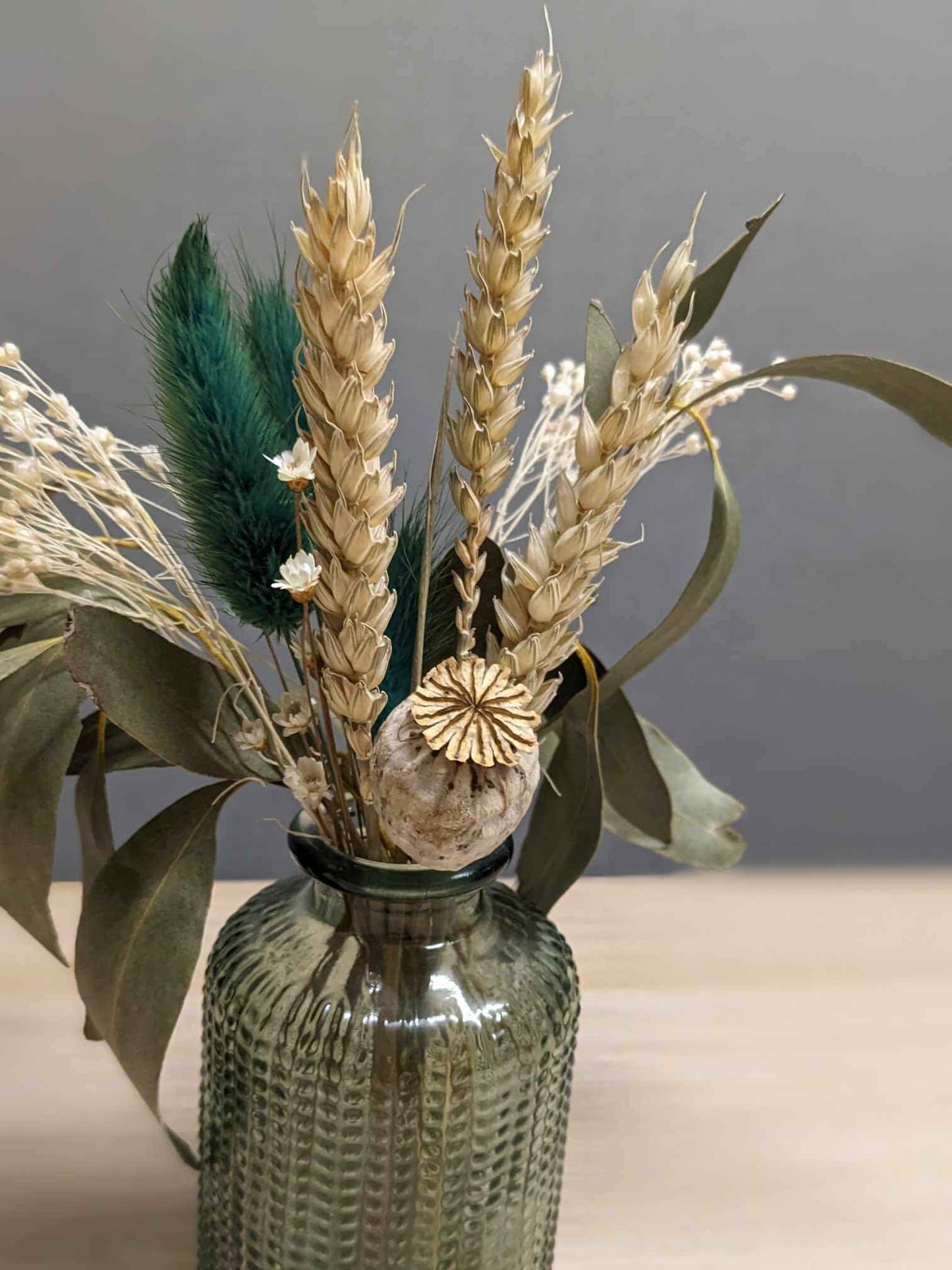 Nature-inspired Bottle Green Vase with Dried Wheat, Bunny Tails and Eucalyptus