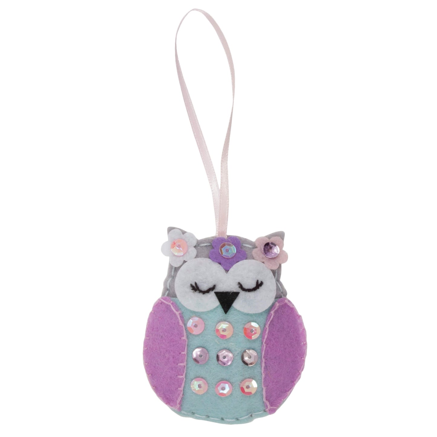  The image shows a felt owl ornament with a pink ribbon hanging from it.