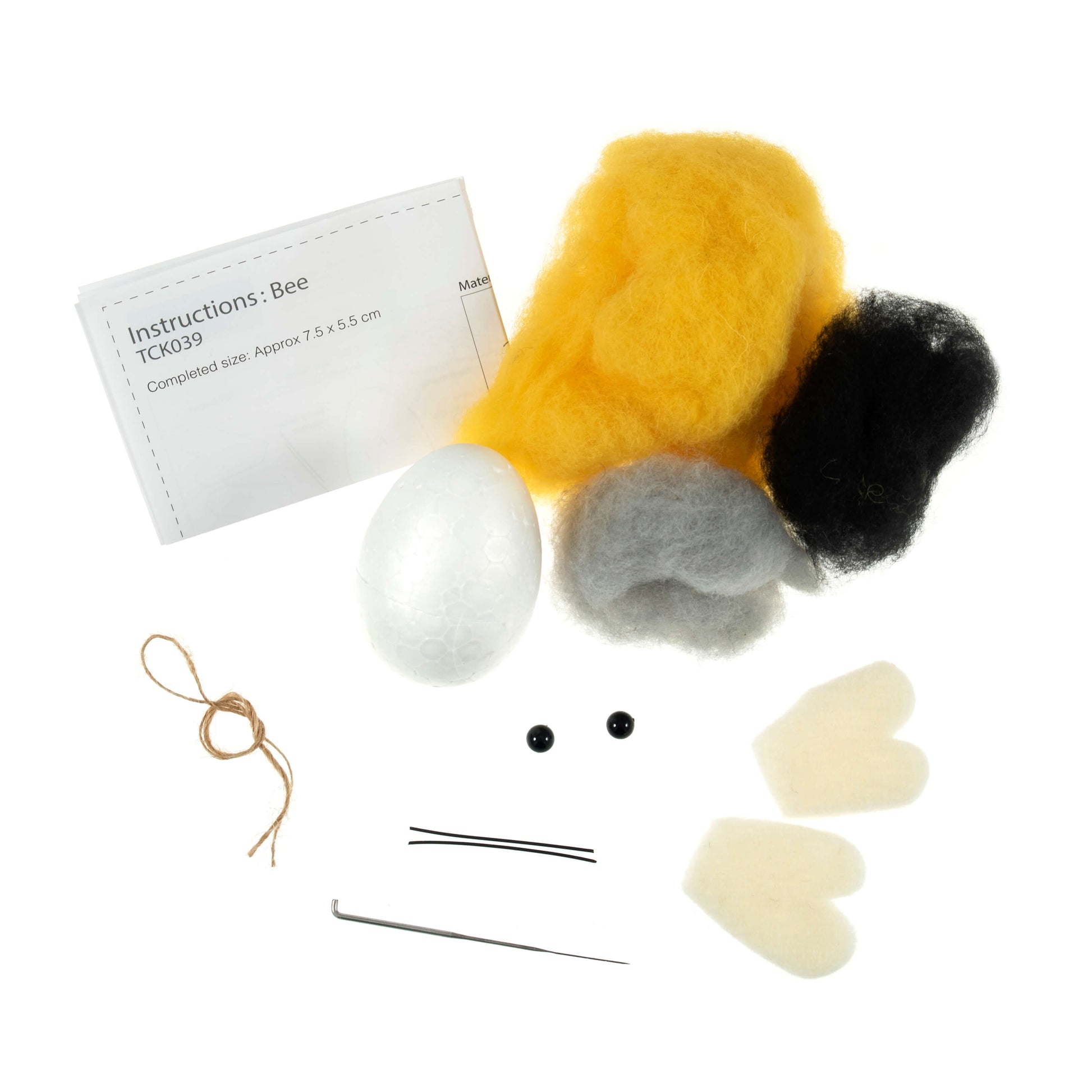 A photo of a needle felting kit with all the supplies needed to create a bee.